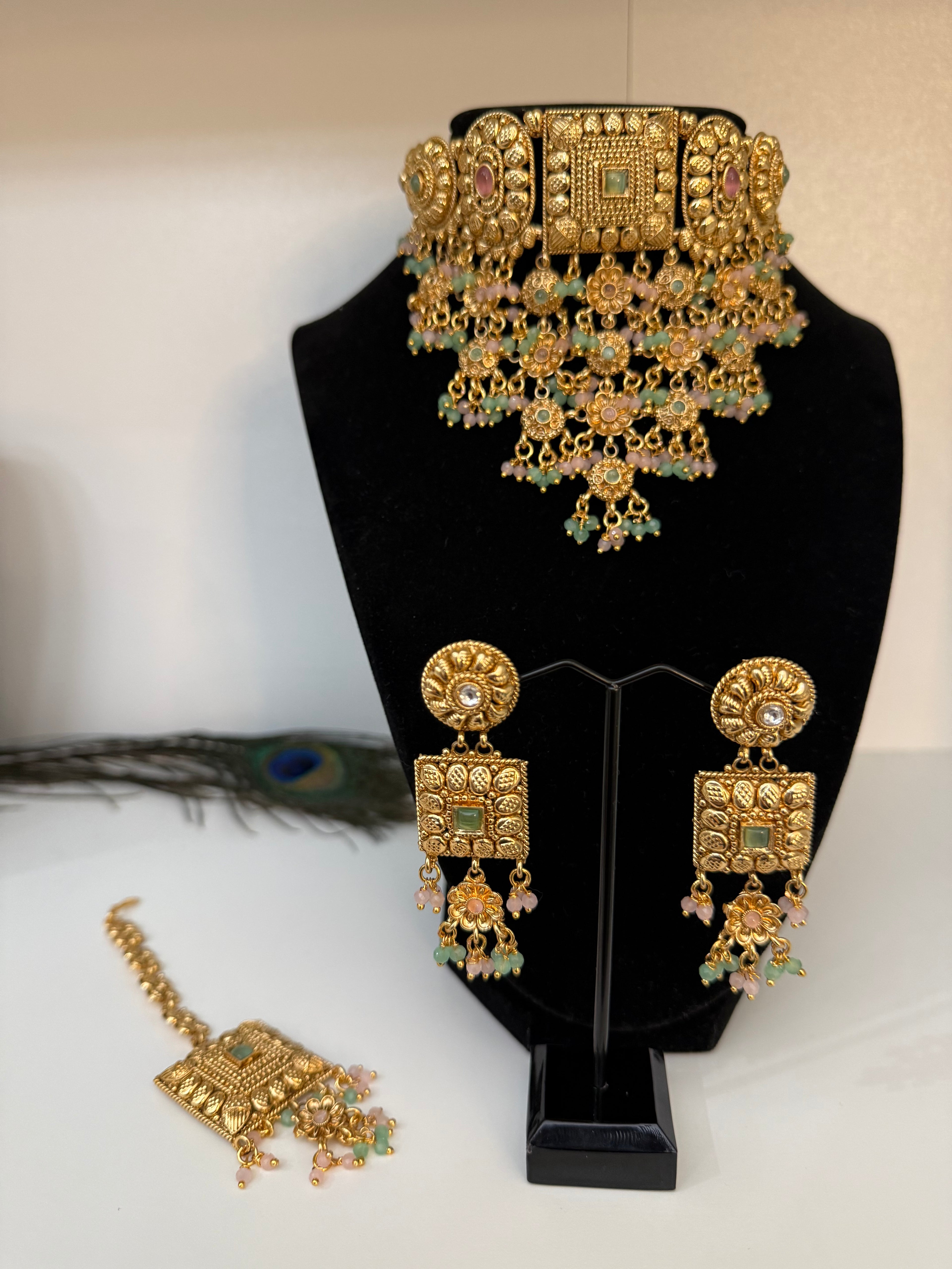 antique gold finish with Kundan-style stones