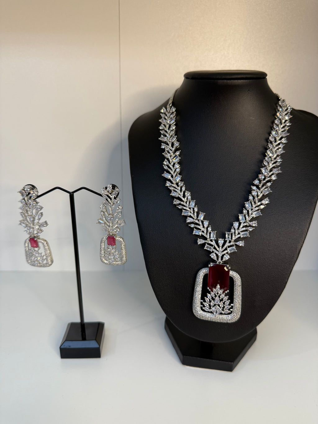 Contemporary moissanite pendant necklace set