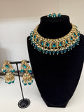 Kundan choker necklace (gold-tone with teal/emerald-colored stones and pearl drops)